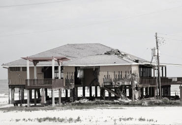 wind damage - spray foam can help prevent uplift to Pierre roofs
